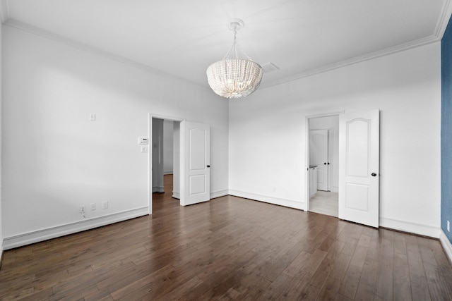 16746 Highland Country Dr, Cypress, TX 77433 - empty room featuring crown molding, a chandelier, and dark wood-style floors