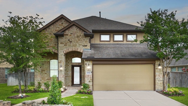 16746 Highland Country Dr, Cypress, TX 77433 - french country style house with stone siding, concrete driveway, roof with shingles, and a garage