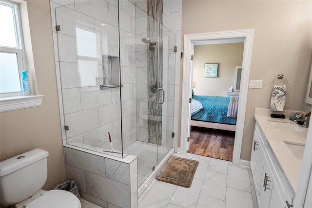 975 S S Cv, Crystal Beach, TX 77650 - ensuite bathroom with a stall shower, vanity, and marble finish floors