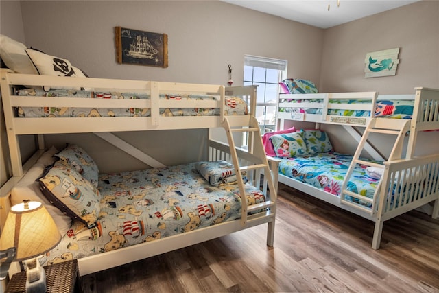975 S S Cv, Crystal Beach, TX 77650 - bedroom with wood finished floors