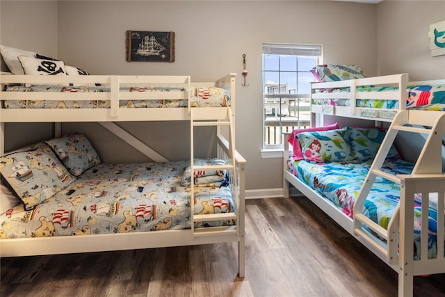 975 S S Cv, Crystal Beach, TX 77650 - bedroom with wood finished floors and baseboards