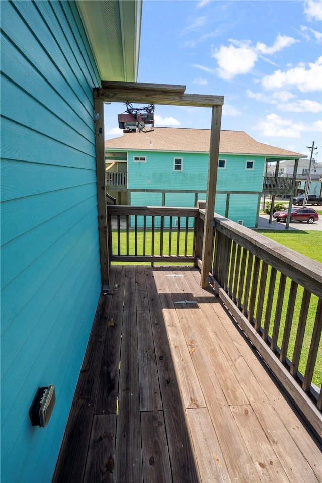 975 S S Cv, Crystal Beach, TX 77650 - deck with a lawn