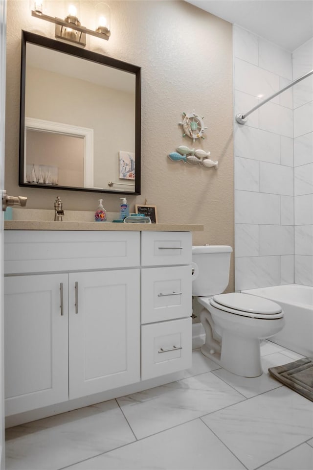 975 S S Cv, Crystal Beach, TX 77650 - bathroom with vanity, marble look tiles, and a textured wall