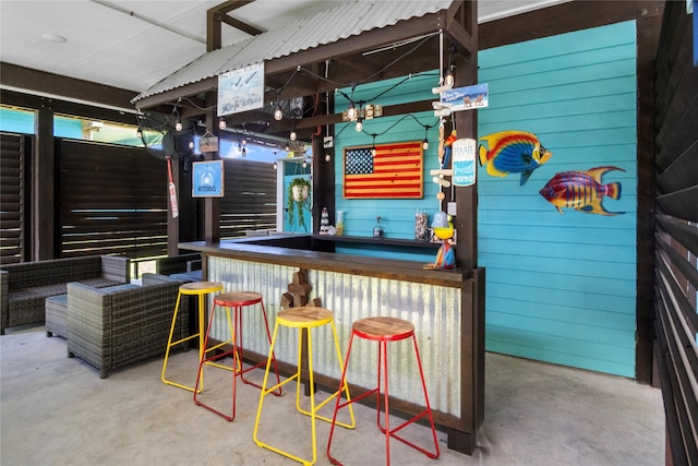 975 S S Cv, Crystal Beach, TX 77650 - community bar area featuring unfinished concrete floors