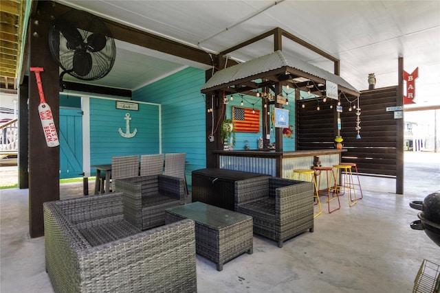 975 S S Cv, Crystal Beach, TX 77650 - view of patio featuring an outdoor hangout area