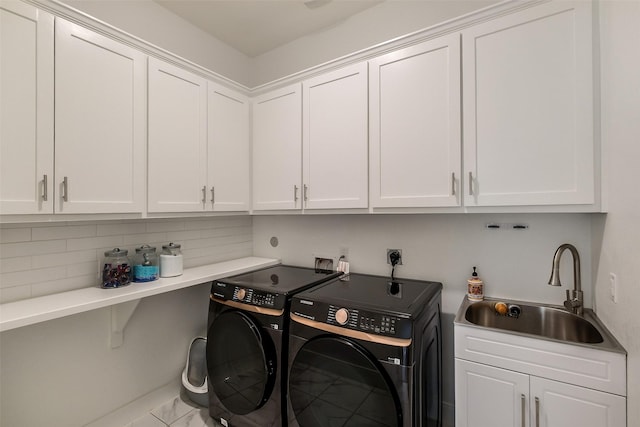 19506 Bradford Pines Ct, Cypress, TX 77433 - laundry room featuring cabinet space and separate washer and dryer