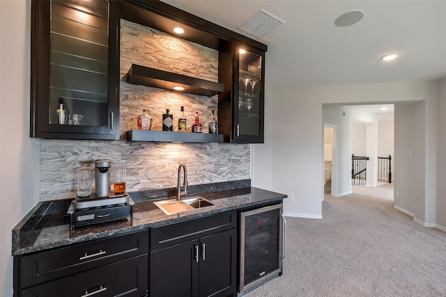 19506 Bradford Pines Ct, Cypress, TX 77433 - indoor wet bar featuring beverage cooler, tasteful backsplash, and light colored carpet