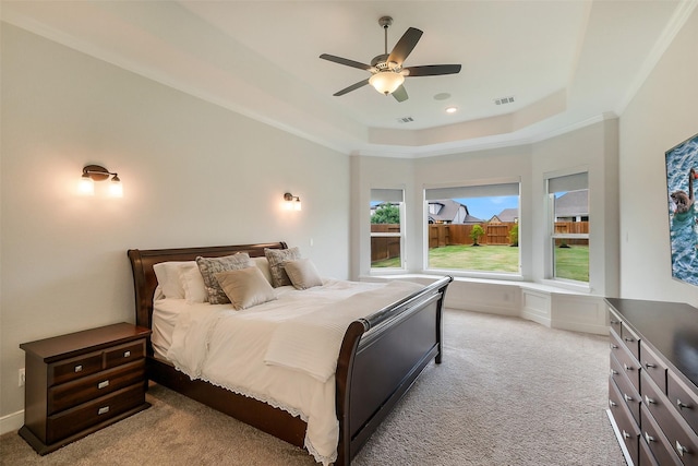 19506 Bradford Pines Ct, Cypress, TX 77433 - carpeted bedroom featuring a raised ceiling and a ceiling fan