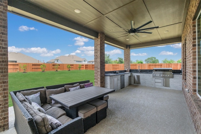 19506 Bradford Pines Ct, Cypress, TX 77433 - fenced backyard featuring exterior kitchen, ceiling fan, a patio area, and outdoor lounge area