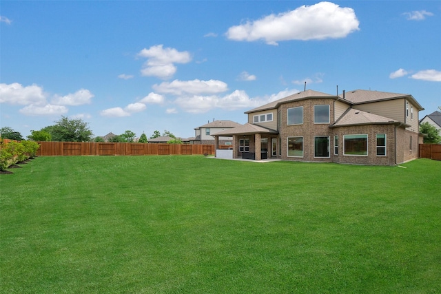 19506 Bradford Pines Ct, Cypress, TX 77433 - rear view of house featuring a gazebo, a fenced backyard, brick siding, and a patio area