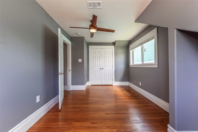 1017 Forest Rd, Clear Lake Shores, TX 77565 - unfurnished bedroom featuring wood finished floors, a closet, and ceiling fan