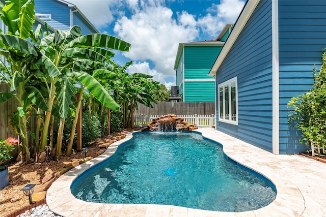 1017 Forest Rd, Clear Lake Shores, TX 77565 - view of swimming pool featuring a fenced backyard and a patio area