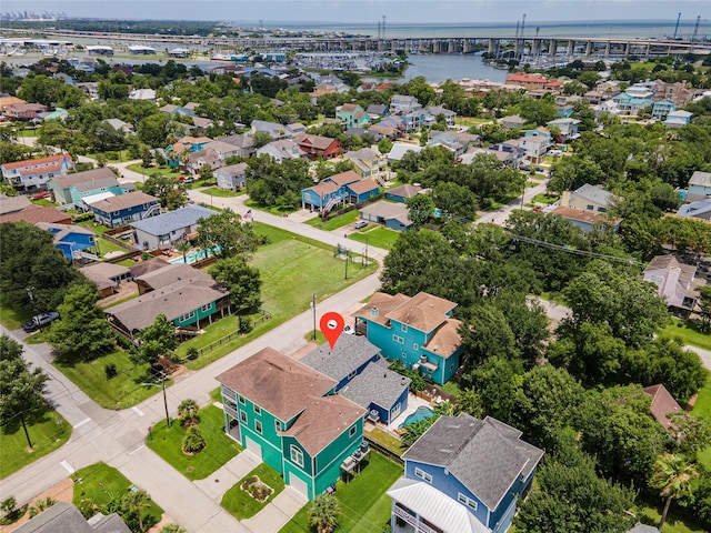 1017 Forest Rd, Clear Lake Shores, TX 77565 - aerial view of residential area featuring a notable bridge and a nearby body of water