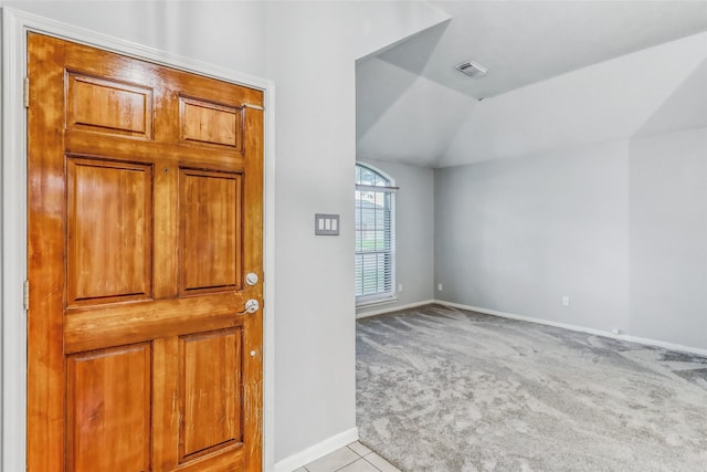 7215 Pembrough Ln, Katy, TX 77494 - entrance foyer featuring light carpet and vaulted ceiling