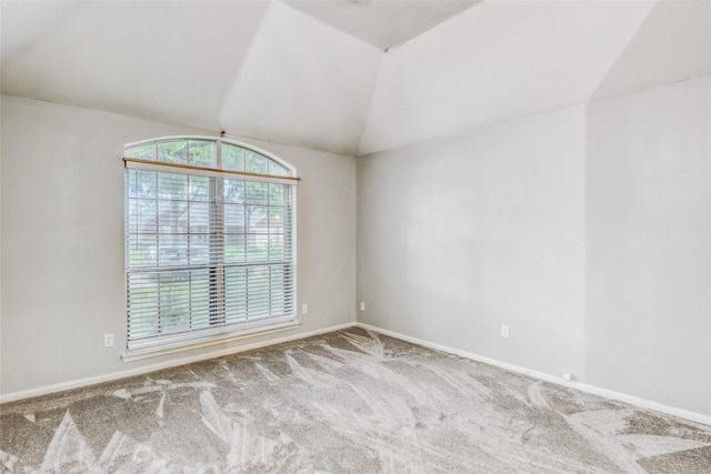 7215 Pembrough Ln, Katy, TX 77494 - carpeted spare room featuring vaulted ceiling and baseboards