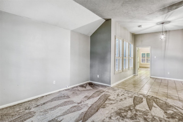 7215 Pembrough Ln, Katy, TX 77494 - carpeted empty room featuring baseboards and tile patterned floors