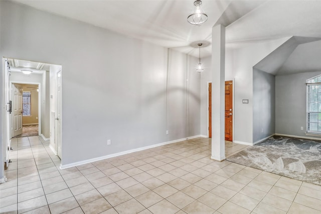7215 Pembrough Ln, Katy, TX 77494 - spare room featuring light tile patterned floors and attic access