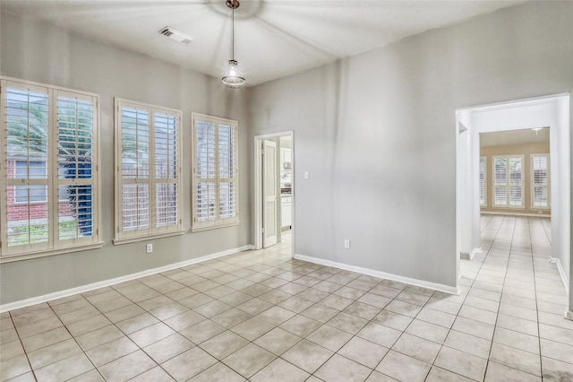 7215 Pembrough Ln, Katy, TX 77494 - unfurnished room featuring light tile patterned floors and baseboards