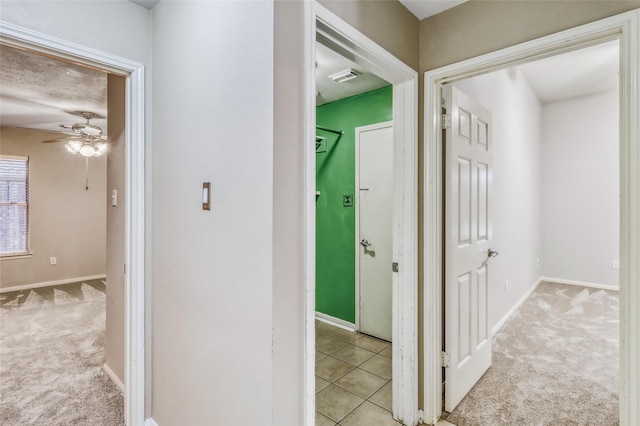 7215 Pembrough Ln, Katy, TX 77494 - hallway with light carpet