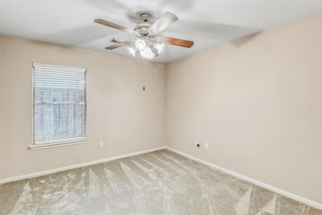 7215 Pembrough Ln, Katy, TX 77494 - empty room with carpet floors and a ceiling fan