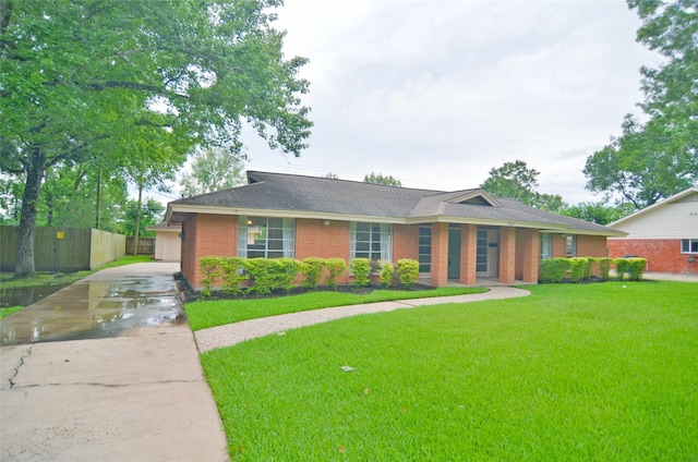 823 Timber Cove Dr, Seabrook, TX 77586 - ranch-style home featuring driveway and brick siding