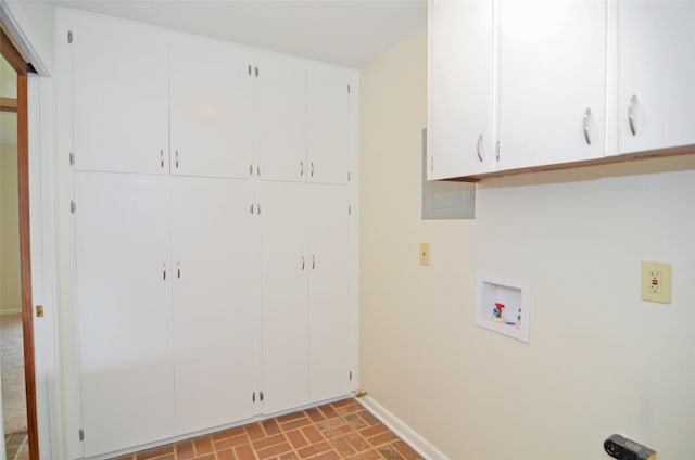 823 Timber Cove Dr, Seabrook, TX 77586 - washroom featuring cabinet space, brick patterned floors, and hookup for a washing machine