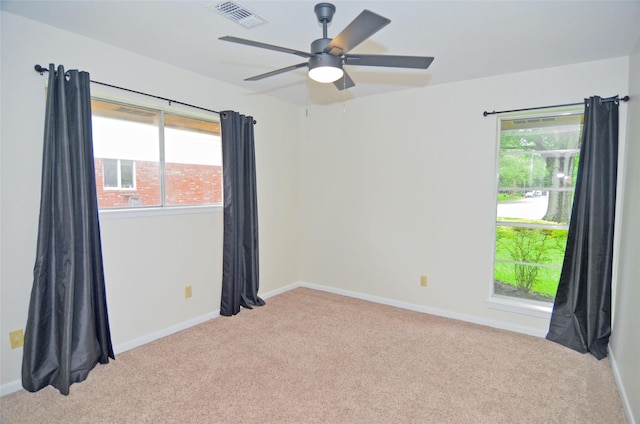 823 Timber Cove Dr, Seabrook, TX 77586 - spare room with light colored carpet and a ceiling fan