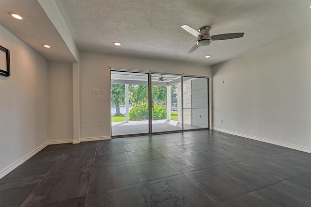 1437 Bowsprit Pt, Willis, TX 77318 - unfurnished room with ceiling fan, a textured ceiling, and recessed lighting