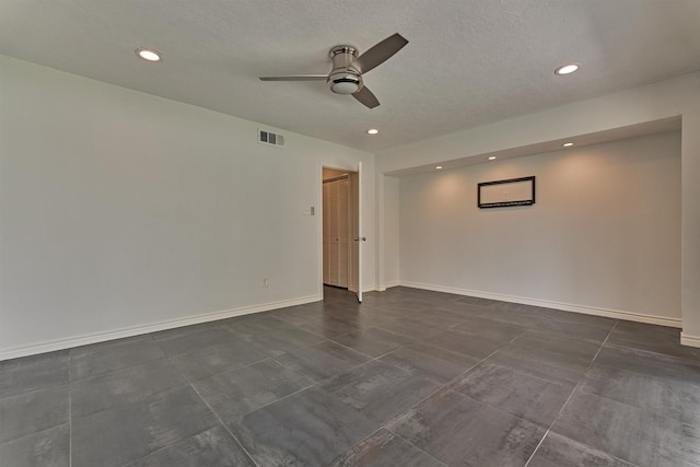 1437 Bowsprit Pt, Willis, TX 77318 - spare room featuring a ceiling fan and recessed lighting