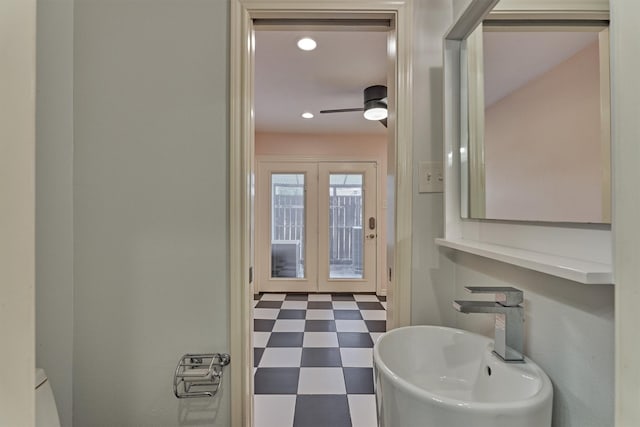 1437 Bowsprit Pt, Willis, TX 77318 - half bath with tile patterned floors and recessed lighting