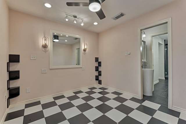 1437 Bowsprit Pt, Willis, TX 77318 - empty room with ceiling fan, tile patterned floors, and recessed lighting