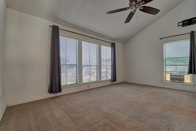 1437 Bowsprit Pt, Willis, TX 77318 - carpeted empty room featuring vaulted ceiling, a ceiling fan, cooling unit, and a textured ceiling