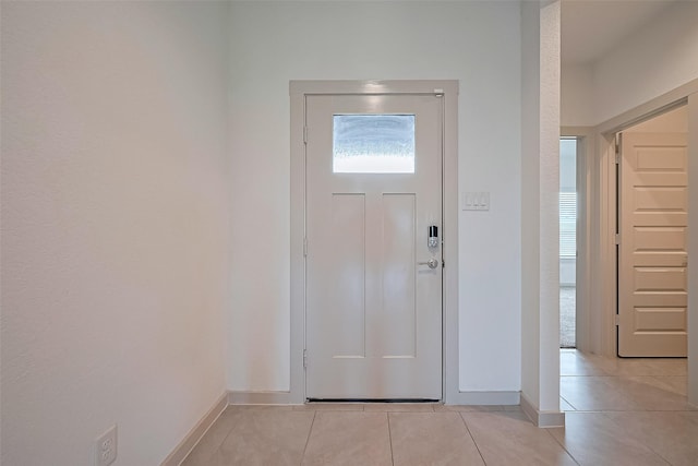 3943 Austins Pass, Katy, TX 77494 - entrance foyer with light tile patterned floors and baseboards