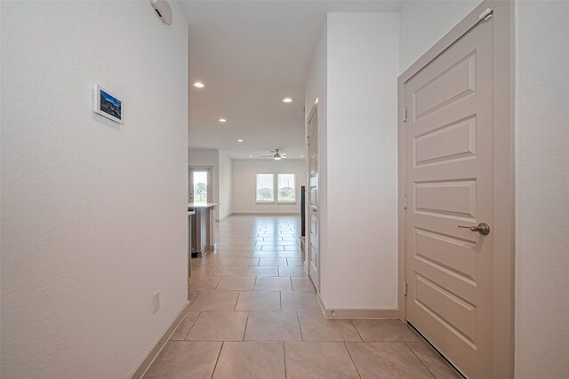 3943 Austins Pass, Katy, TX 77494 - hall featuring recessed lighting and light tile patterned floors