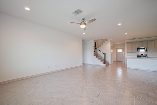 3943 Austins Pass, Katy, TX 77494 - unfurnished living room with recessed lighting, stairs, light tile patterned flooring, and a ceiling fan