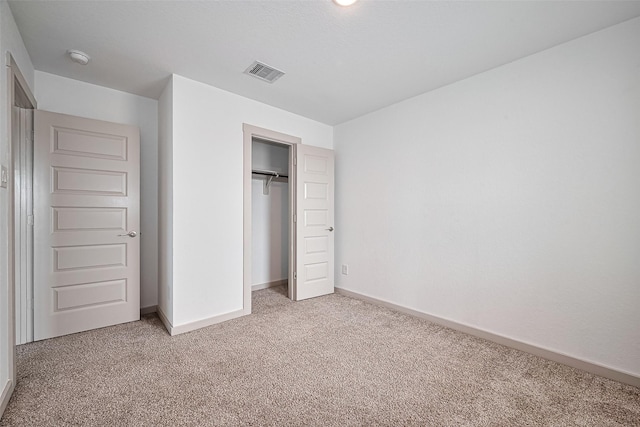3943 Austins Pass, Katy, TX 77494 - unfurnished bedroom with light carpet and a closet