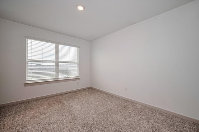 3943 Austins Pass, Katy, TX 77494 - spare room with light colored carpet and recessed lighting
