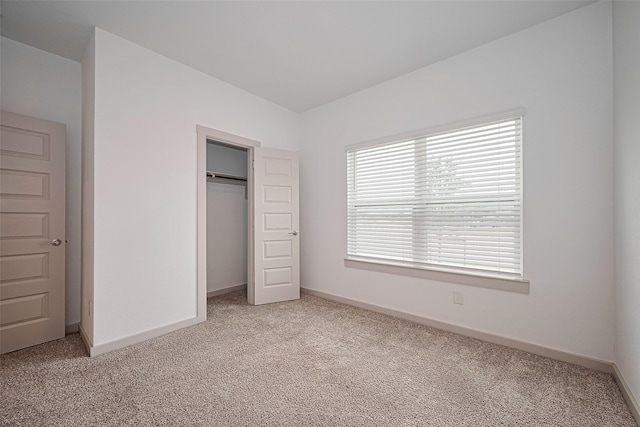 3943 Austins Pass, Katy, TX 77494 - unfurnished bedroom with light colored carpet and a closet