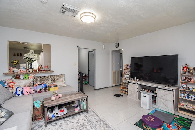 12469 Sharpview Dr Unit 2469, Houston, TX 77072 - living area featuring a textured ceiling