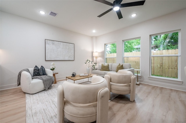 8122 Corinth St, Houston, TX 77051 - living room with a ceiling fan, light wood-style floors, and recessed lighting