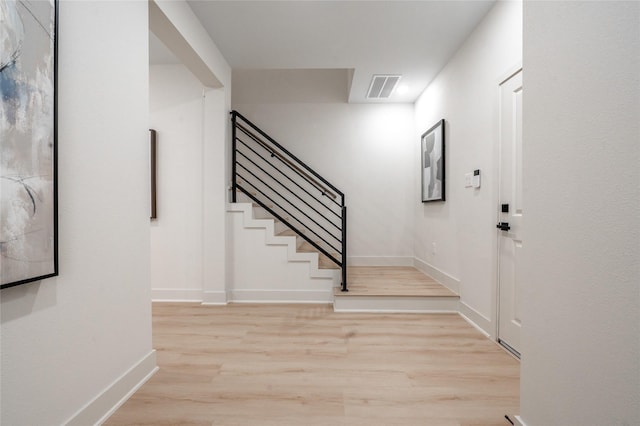 8122 Corinth St, Houston, TX 77051 - entryway featuring wood finished floors and stairway