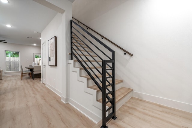 8122 Corinth St, Houston, TX 77051 - stairway with wood finished floors and recessed lighting