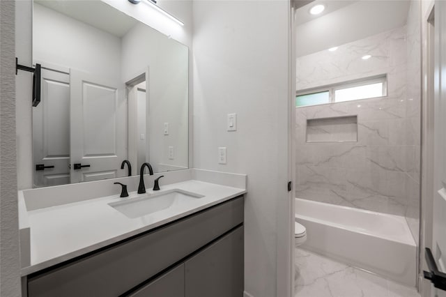 8122 Corinth St, Houston, TX 77051 - full bath with vanity, marble look tiles, and bathing tub / shower combination
