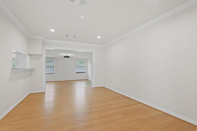 5426 Carew St, Houston, TX 77096 - unfurnished room featuring ornamental molding, light wood-style floors, and recessed lighting