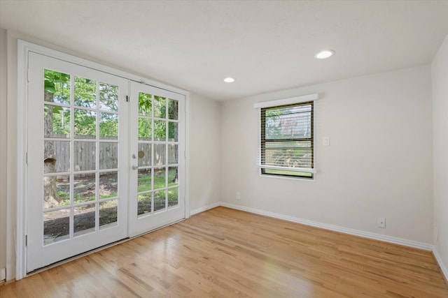 5426 Carew St, Houston, TX 77096 - spare room with light wood finished floors and recessed lighting
