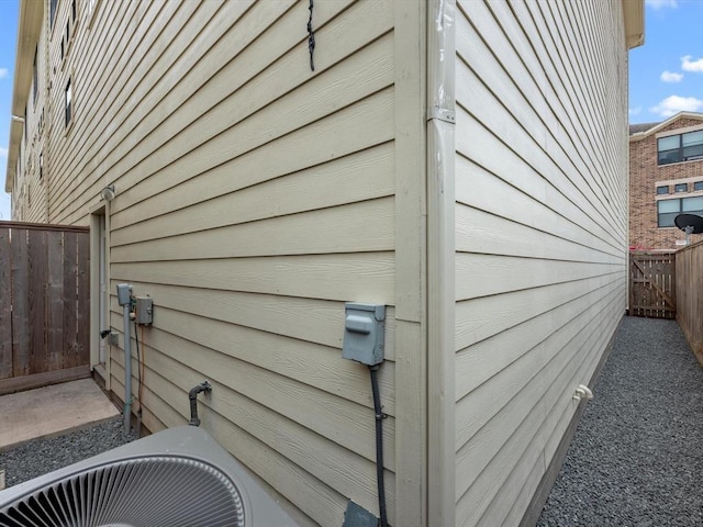 2710 Hullsmith Dr Unit 1004, Houston, TX 77063 - view of side of home featuring a central AC unit