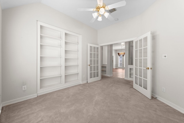 8722 Melting Shadows Ln, Houston, TX 77095 - carpeted spare room featuring french doors, a chandelier, and ceiling fan