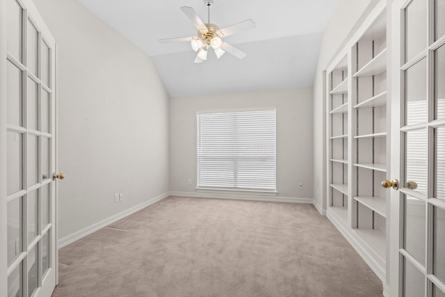 8722 Melting Shadows Ln, Houston, TX 77095 - carpeted spare room with lofted ceiling, a ceiling fan, and french doors