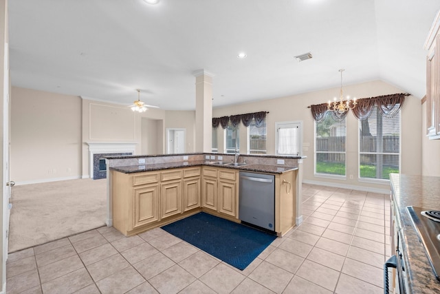 8722 Melting Shadows Ln, Houston, TX 77095 - kitchen featuring appliances with stainless steel finishes, light tile patterned flooring, open floor plan, ceiling fan, and a chandelier
