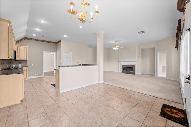 8722 Melting Shadows Ln, Houston, TX 77095 - unfurnished living room featuring light tile patterned floors, a high end fireplace, light carpet, ceiling fan, and a chandelier